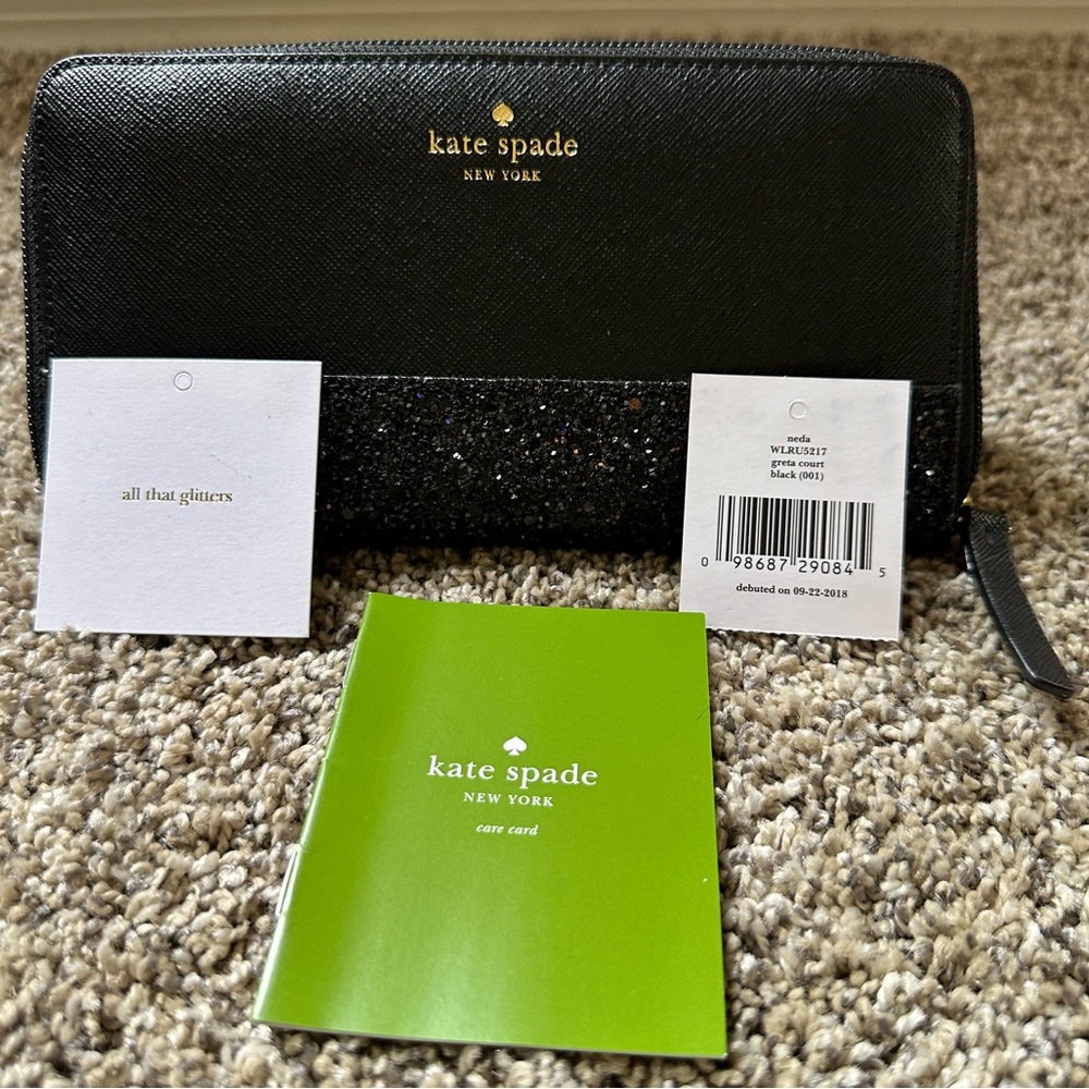 KATE SPADE-NEDA all that glitters black zip around wallet. Gently used with tags